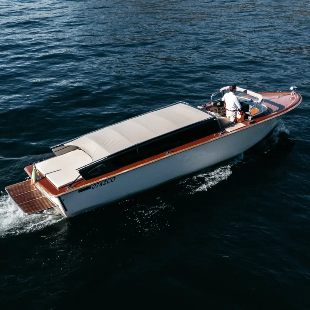 Water taxi with rain protection on Lake Como