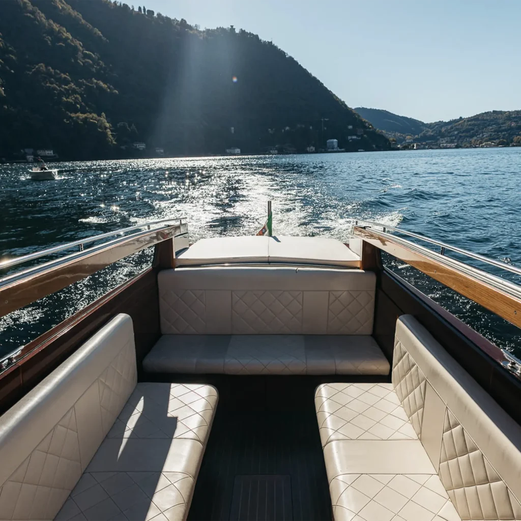 Seating area of Il Medeghino water taxi seen from above on Lake Como