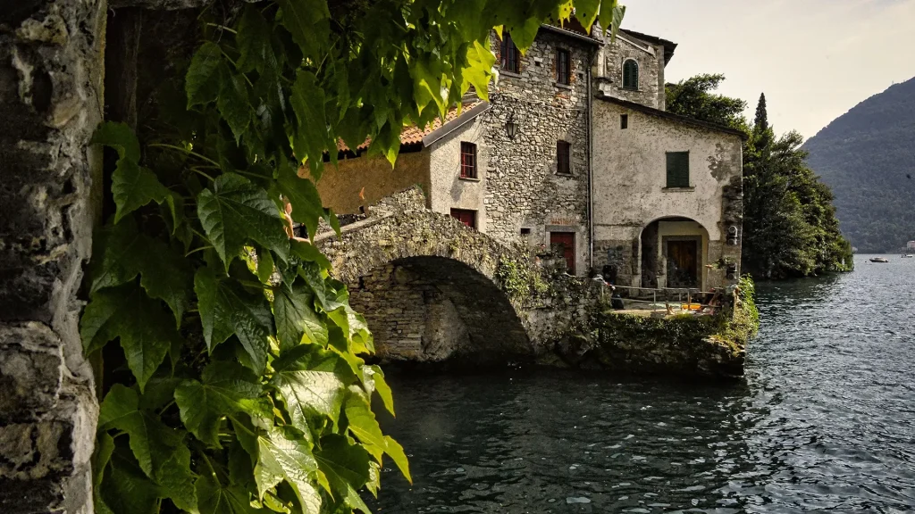 Nesso and the Rom bridge seen from a private boat